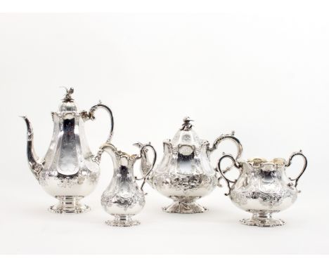 A Victorian four-piece silver tea set, the teapot and coffee pot, London 1856, the sugar basin and jug, Sheffield 1854, the c