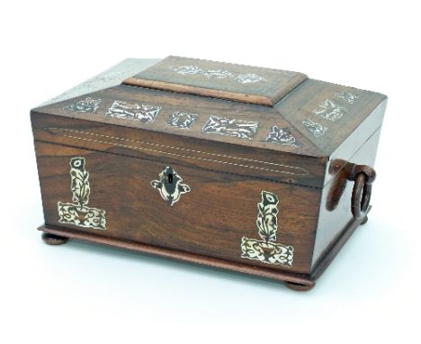 A Regency rosewood work box, inlaid mother-of-pearl with fitted interior and ring handles to the sides, 32cm wide