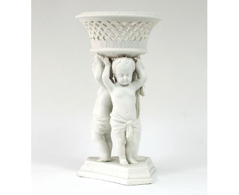 A Copeland parian porcelain centrepiece, modelled as three putti holding up a circular pierced basket on a shaped tripod base