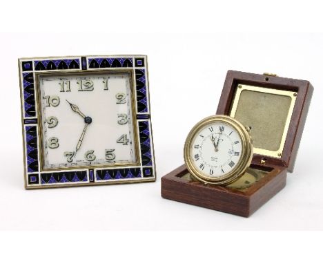 An eight-day bedside clock, the square dial with Arabic numerals within a blue and black enamel frame, on an easel back, 8.5c