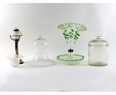 A three-stem glass epergne, each stem with white opaque flare bowl and applied green glass to stem and rim, the stand of circ