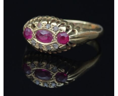 An early 20th Century ruby and diamond ring, in a galleried setting to an 18ct gold shank, ring size P