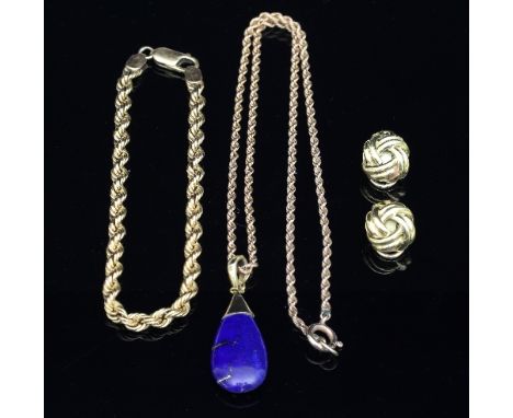 A pair of 18ct gold knot ear clips, a lapis pendant in 14k mount, a 9ct gold rope twist neck chain and a Portuguese gold brac