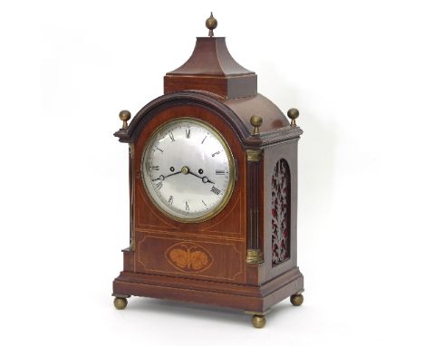 An 19th Century bracket clock, the silvered dial with Roman numerals, fitted a twin fusee striking movement and set in a maho