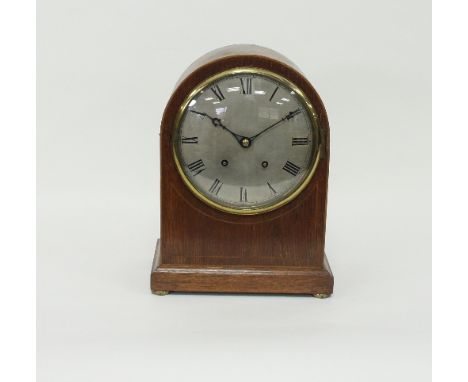 An Edwardian oak arch-top eight-day mantel clock, Winterhalder & Hofmeier, three quarters and hour striking on a gong, banded
