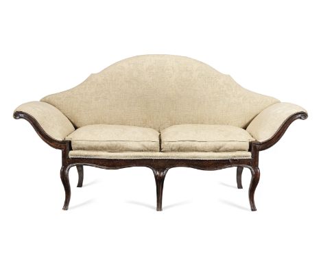 An Italian stained beech and grained sofaThe shaped back above outscrolled arm supports, with waved and channelled frames, on