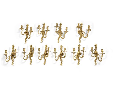 A set of ten French gilt bronze figural twin light appliquesin the Louis XVI style, probably late 19th/early 20th centurythe 