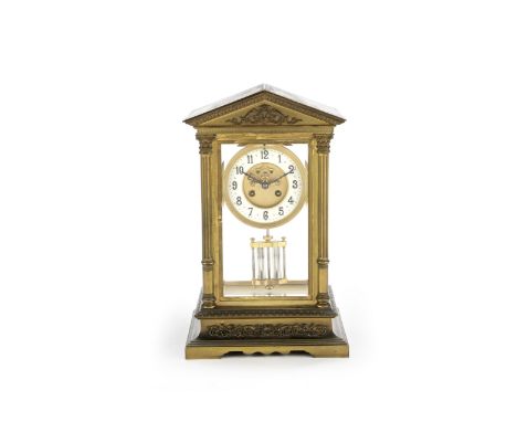 A late 19th/early 20th century French gilt brass portico clockthe movement stamped Vincenti et Cie, and with Maples retailers