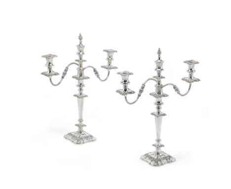 A pair of silver three-light candelabraBarker Ellis Silver Co, Birmingham 1972Tapering cylindrical columns with ornate floral