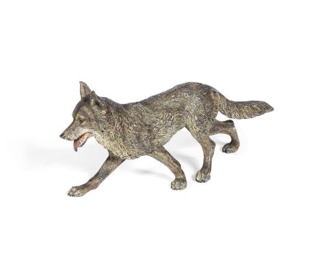 An Austrian cold painted bronze model of a wolfin the manner of Franz Xaver Bergmann (Austrian, 1861–1936)the striding beast 