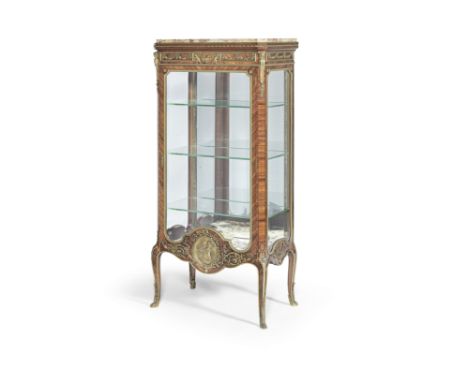 A French late 19th/early 20th century gilt bronze mounted kingwood vitrine attributed to Francois Linke (1855-1946)The moulde