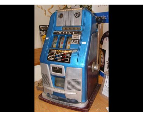 A vintage Mills 'Special Award 777' one-arm bandit arcade fruit machineCONDITION REPORTIn our judgement, condition of lot is 