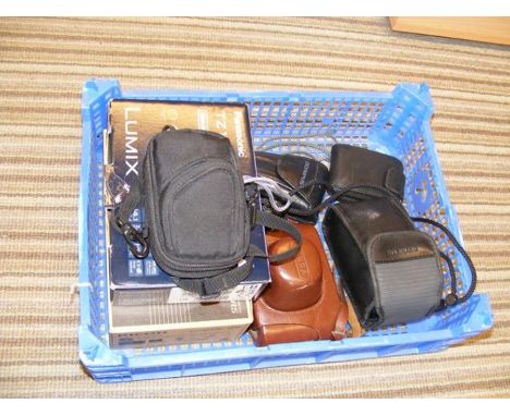 A selection of vintage cameras, including Werra and Lumix