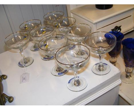 Nine vintage Babycham coupe glasses