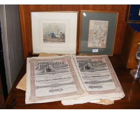 An antique strip map of North Wales, Fores cartoon print, together with a quantity of Bond Certificates