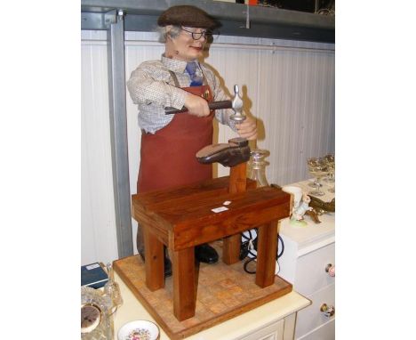 A automaton cobbler - height 77cmsCONDITION REPORTIn our judgement, condition of lot is good. Some areas of paint have cracke