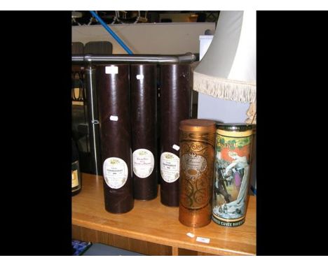 Five vintage wines in presentation tins 