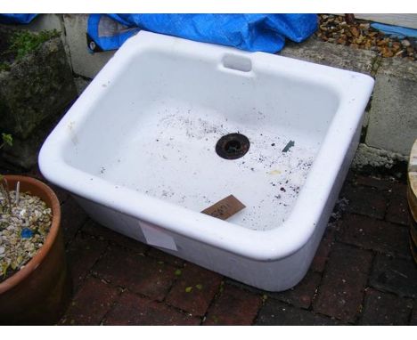 A white enamel butlers sink