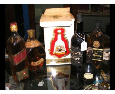 A vintage bottle of Dow's port 1970, a vintage Johnnie Walker scotch whiskey etc.CONDITION REPORT.