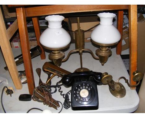 A reproduction lace maker's lamp, a vintage black telephone, silver back mirror, etc. 