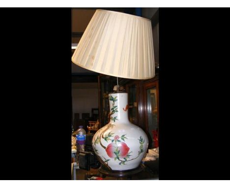 A Chinese style baluster ceramic table lamp with peach design 