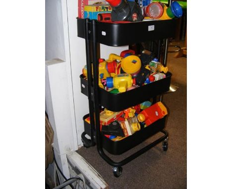 An Ikea caddy on castors