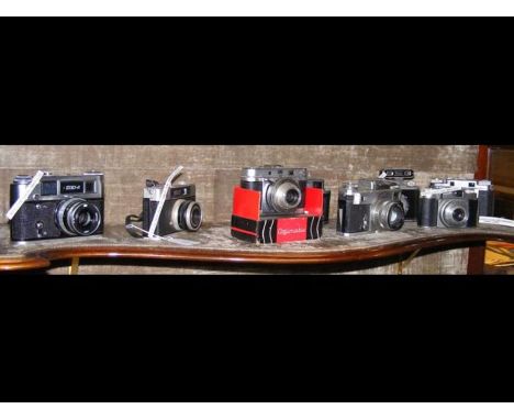 A vintage Agimatic camera, together with other German, Russian cameras