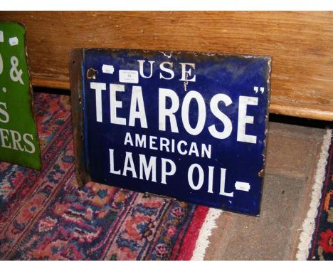 A vintage enamel sign with blue ground - 'Use Tea Rose American Lamp Oil' - double sided - 25cm x 33cm 