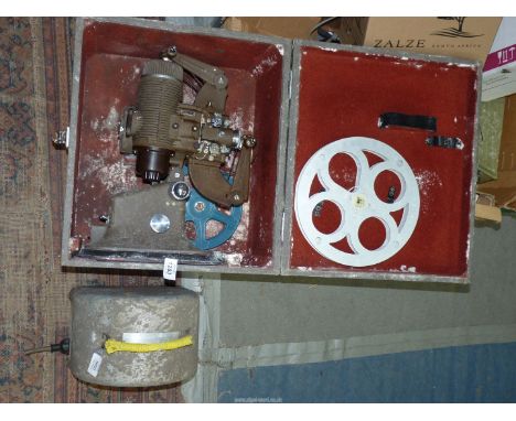 A Bell and Howell Gaumont Model 613 16mm Cine Projector in original fitted box and with heavy transformer, a/f.