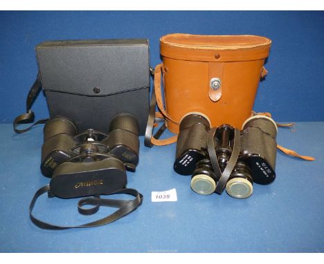 Two pairs of cased binoculars, Minox 8X 20 x 50 and Revue 10 x 50.