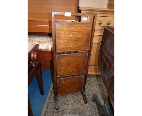 An Oak metamorphic Firescreen/Cakestand having three rectangular shelf tiers.