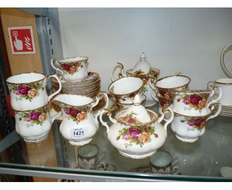 A Royal Albert 'Old Country Roses' part tea set to include teapot, seven cups and eight saucers, cream jug, sucrier, six tea 