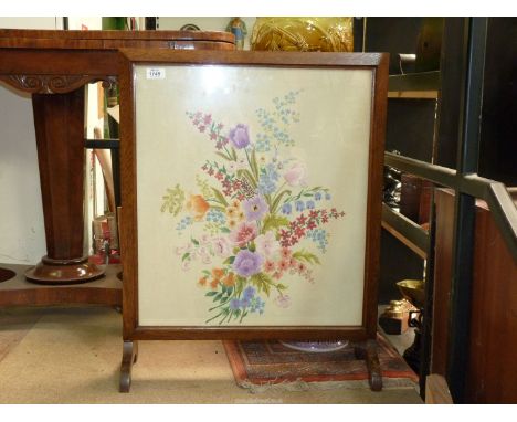 A square wood framed fire screen having embroidered flower sprays scene on cream ground, 22" wide x 27 1/2" tall.