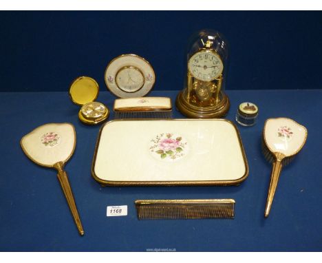 A Dressing Table set of brush and comb, clothes brush, mirror and tray with floral design to the backs, pin jar with painting