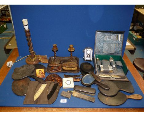 A quantity of dressing table items including mirrors, brushes, clock, two Bakelite candlesticks, lamp (no shade) and a gents 