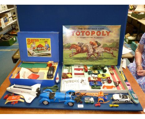 A box of vintage toys to include Toto Poly and Bayko and cars etc.