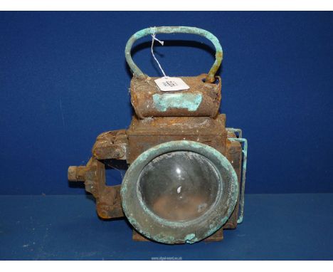 An old Railway Lamp in need of restoration vut with lenses.