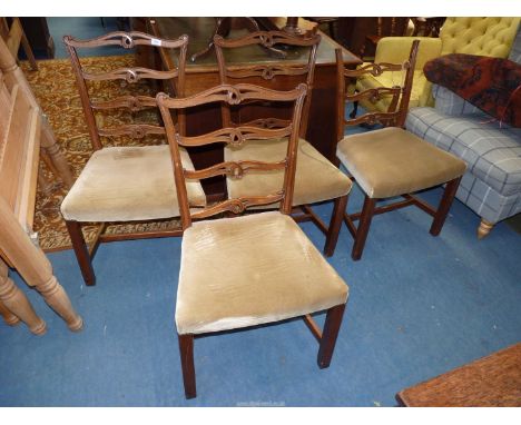 A set of four Georgian design Mahogany framed broad seated ladder-back Dining Chairs having olive green velvet upholstered ov