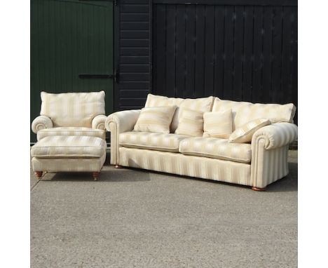 A Duresta cream striped upholstered three seater sofa, 230cm, together with a matching armchair and upholstered stool