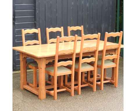 A light oak refectory table, 198 x 99cm, together with a set of six ladderback dining chairs