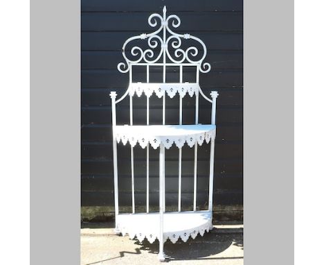 A white painted metal shelf, 74cm