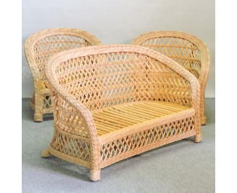 A wicker conservatory sofa, 134cm, together with a pair of matching armchairs