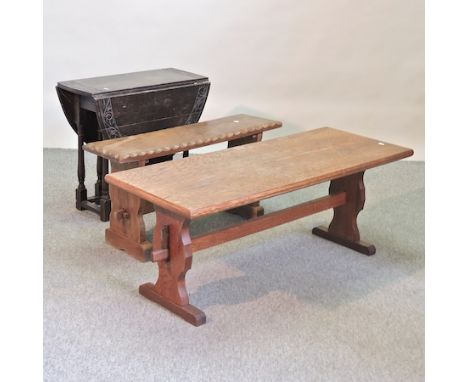 A small 1920's carved oak gateleg table, together with an oak occasional table, 90cm, and a bench