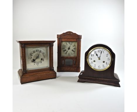 A Junghans mantel clock, 27cm high, together with two other clocks