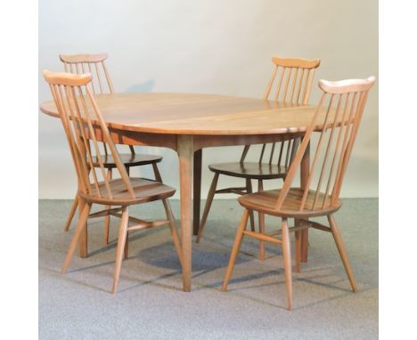 A Nathan teak extending dining table, 168 x 122cm, together with four Ercol light elm dining chairs