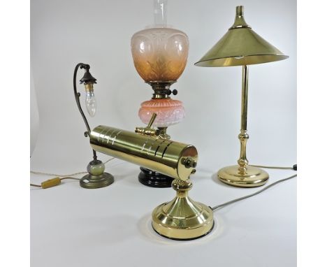 A brass desk lamp, together with two others smaller and a Victorian brass oil lamp, 63cm high