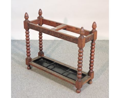 A carved oak stick stand, 76cm