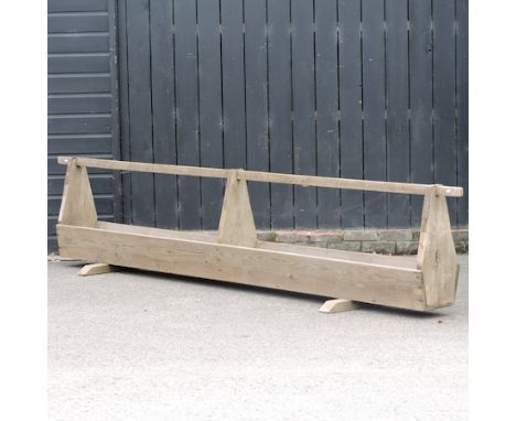 A vintage wooden animal feed trough, 337cm