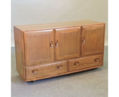 An Ercol light elm sideboard, 129cm