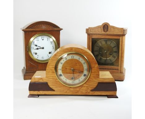 An oak cased mantel clock, 24cm high, together with two others